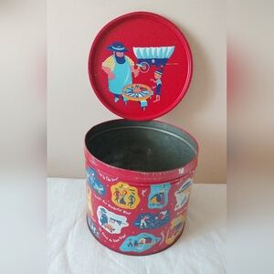 Vintage Pennsylvania Dutch pretzel tin w/ Amish sayings graphics d 12.25" h10.5"